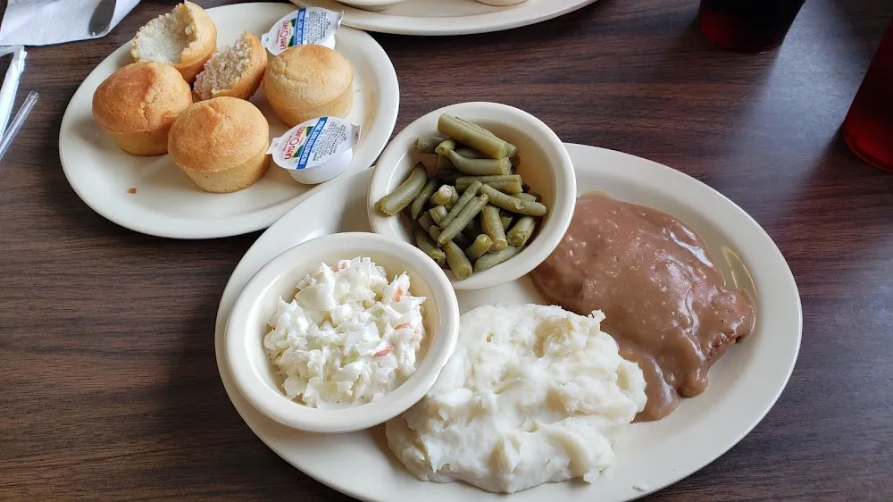 Country Steak with Brown Gravy Mashed Potatoes Green Beans Cole Slaw Cornbread